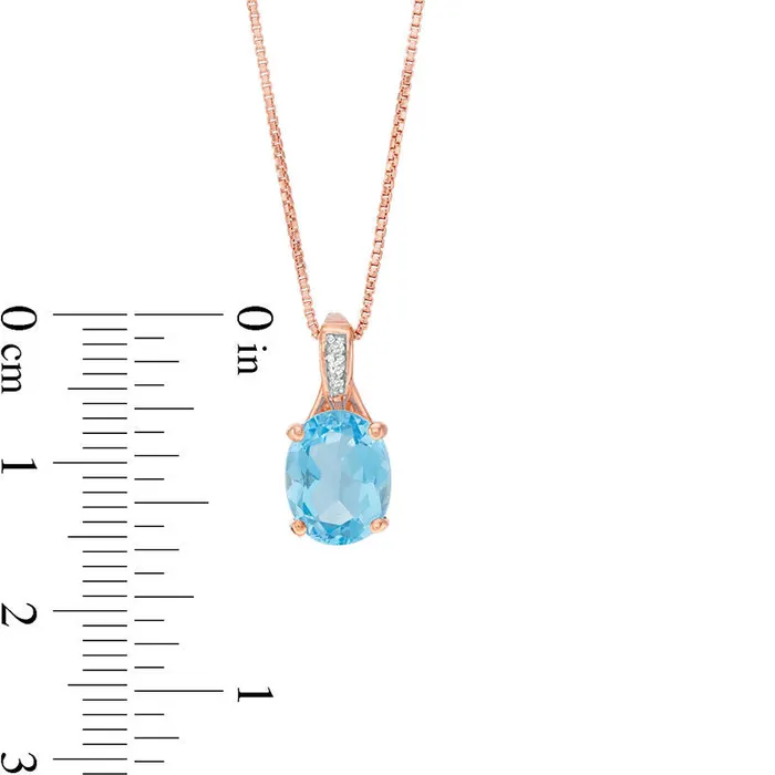 Goldia Necklaces Oval Blue Topaz and Natural Diamond Accent Pendant in Sterling Silver with Rose Rhodium Goldia Necklaces Oval Blue Topaz and Natural Diamond Accent Pendant in Sterling Silver with Rose Rhodium
