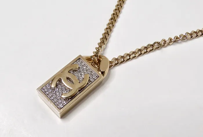 Vintage by Misty Chanel GoldTone Crystal Dog Tag Style Pendent Chain Necklace Necklaces